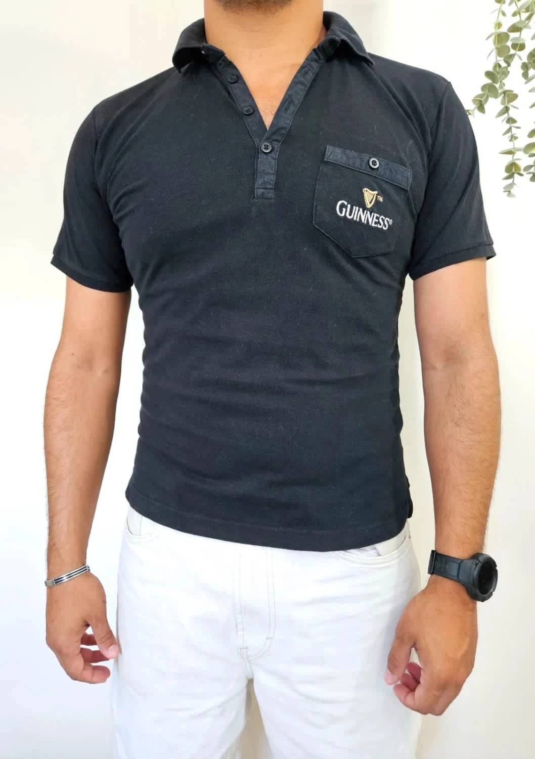 Polo noir Guinness logo brodé taille L