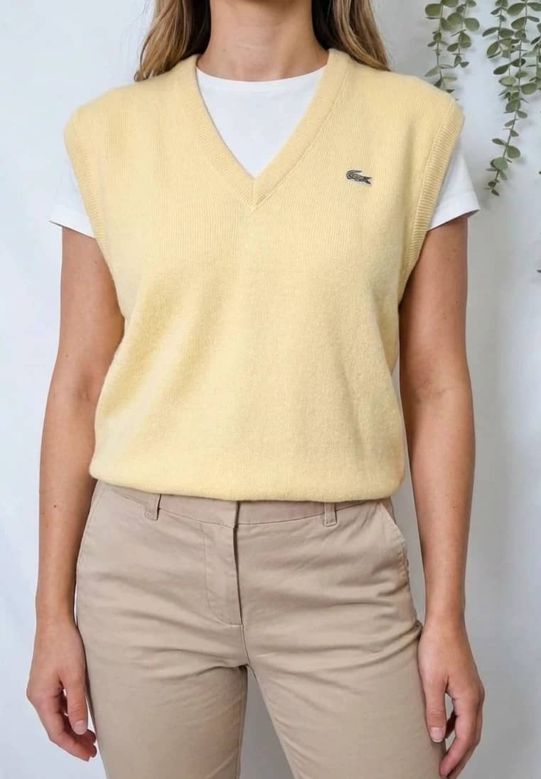 Pull sans manches vintage Lacoste jaune pastel en laine taille XL