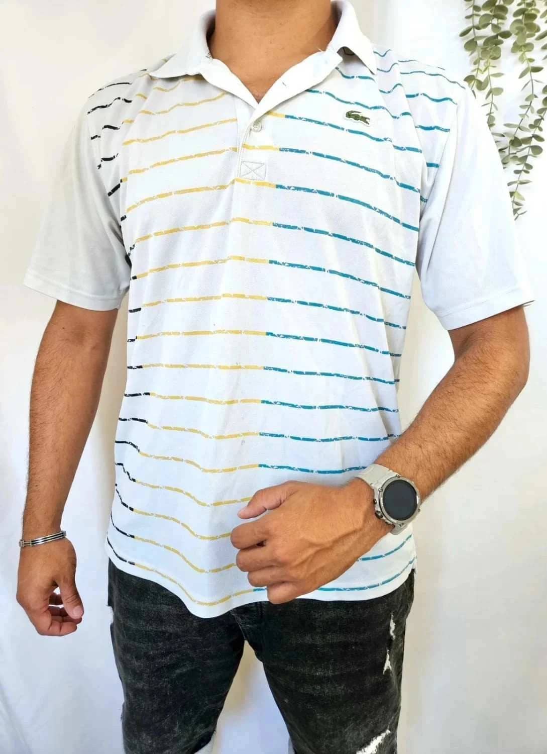 Polo Homme Lacoste à rayures taille XL