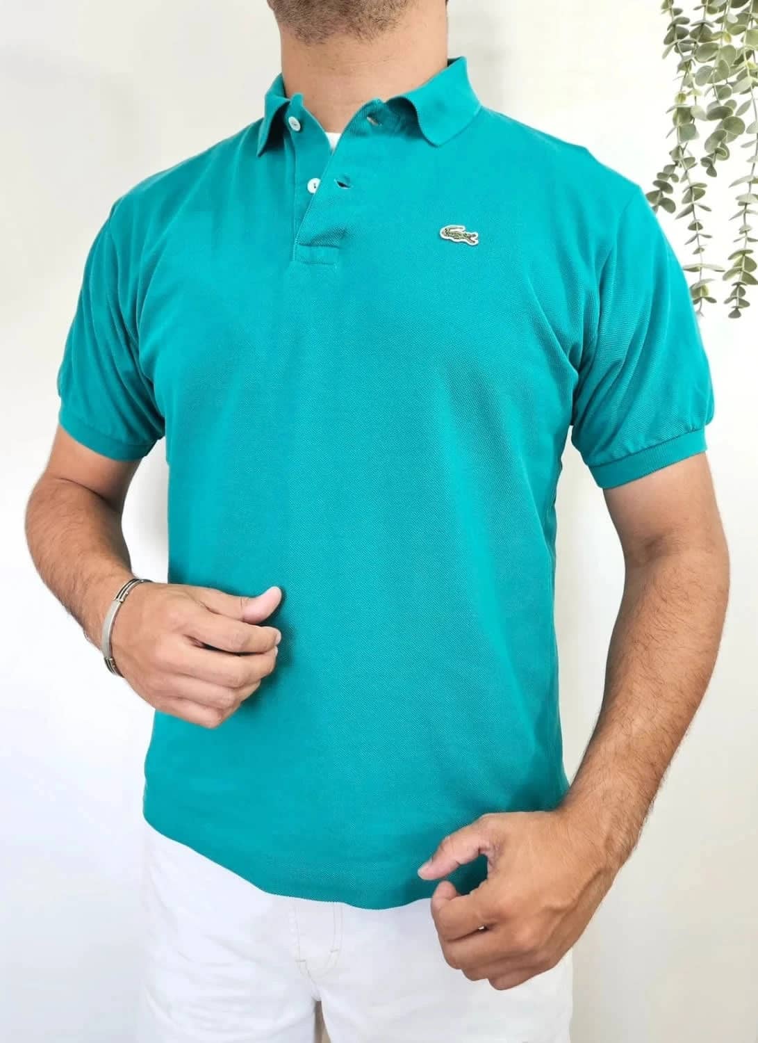 Polo Lacoste vert Devanlay taille 5/L