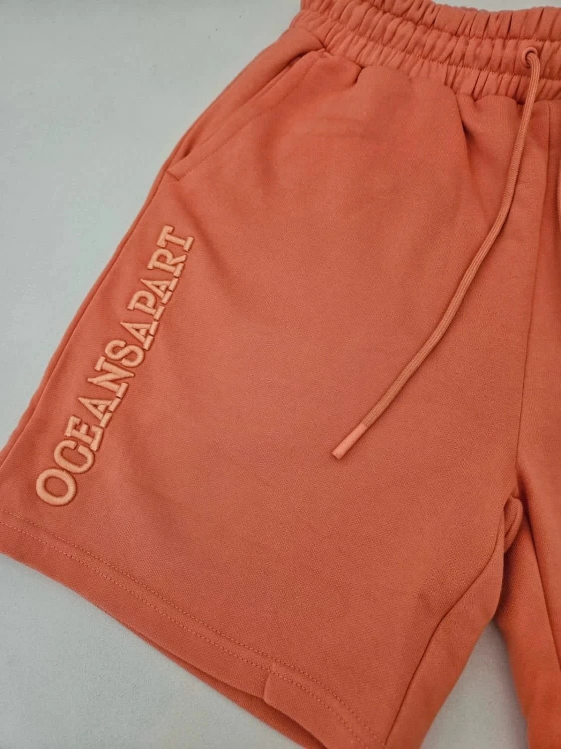 Short élastique Oceans Apart orange logo brodé taille S - Photo 3/8