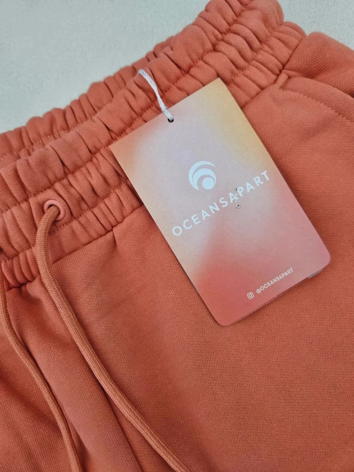Short élastique Oceans Apart orange logo brodé taille S - Photo 6/8
