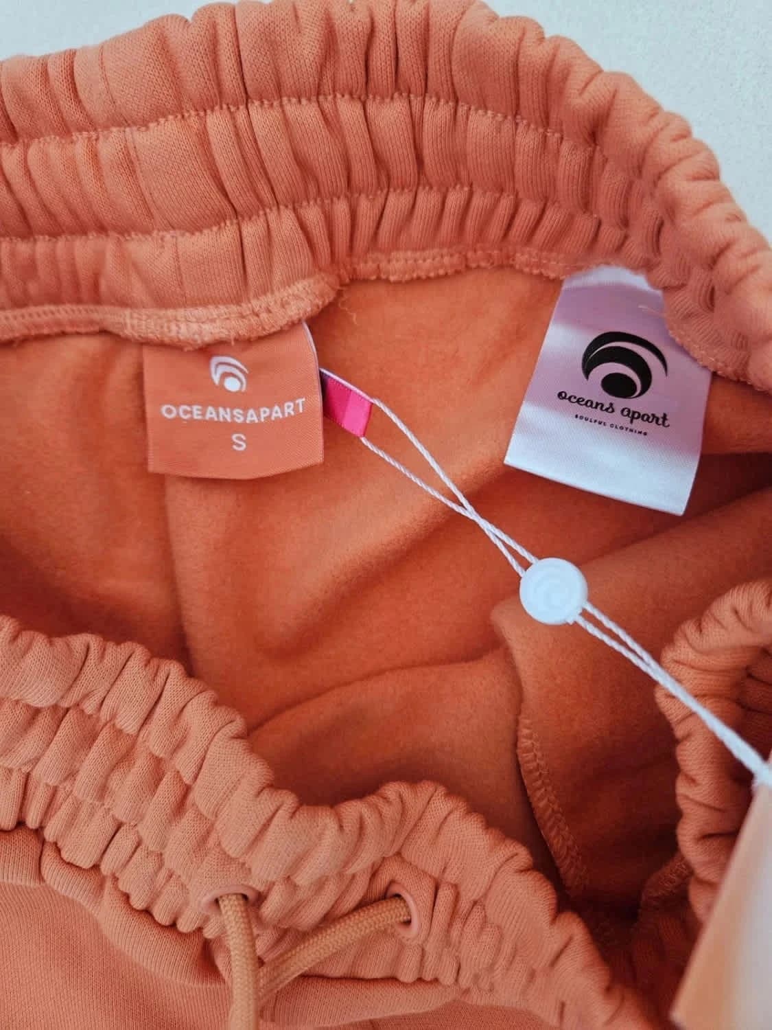 Short élastique Oceans Apart orange logo brodé taille S - Photo 7/8