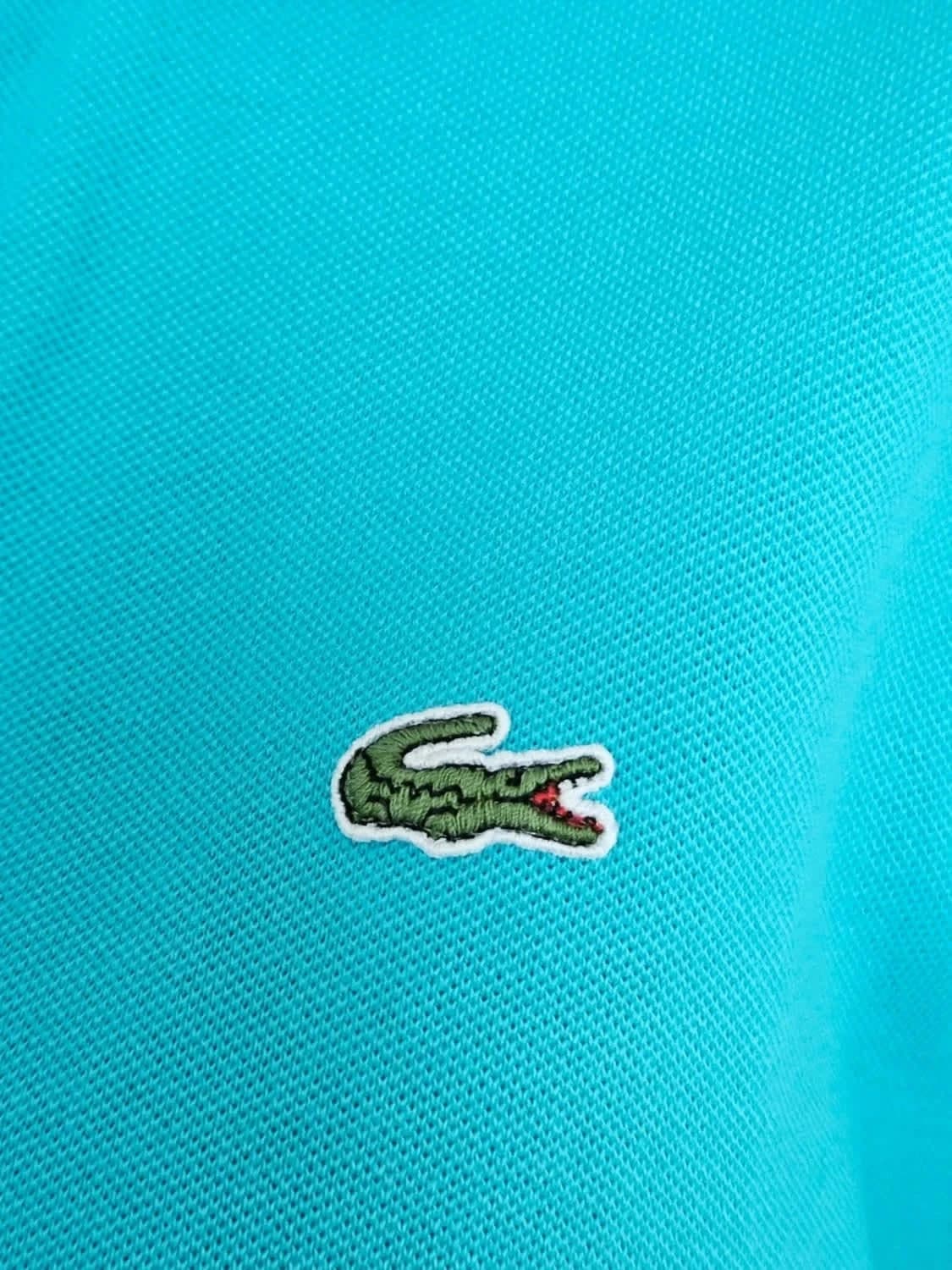 Polo Lacoste édition limitée taille L - Photo 6/7