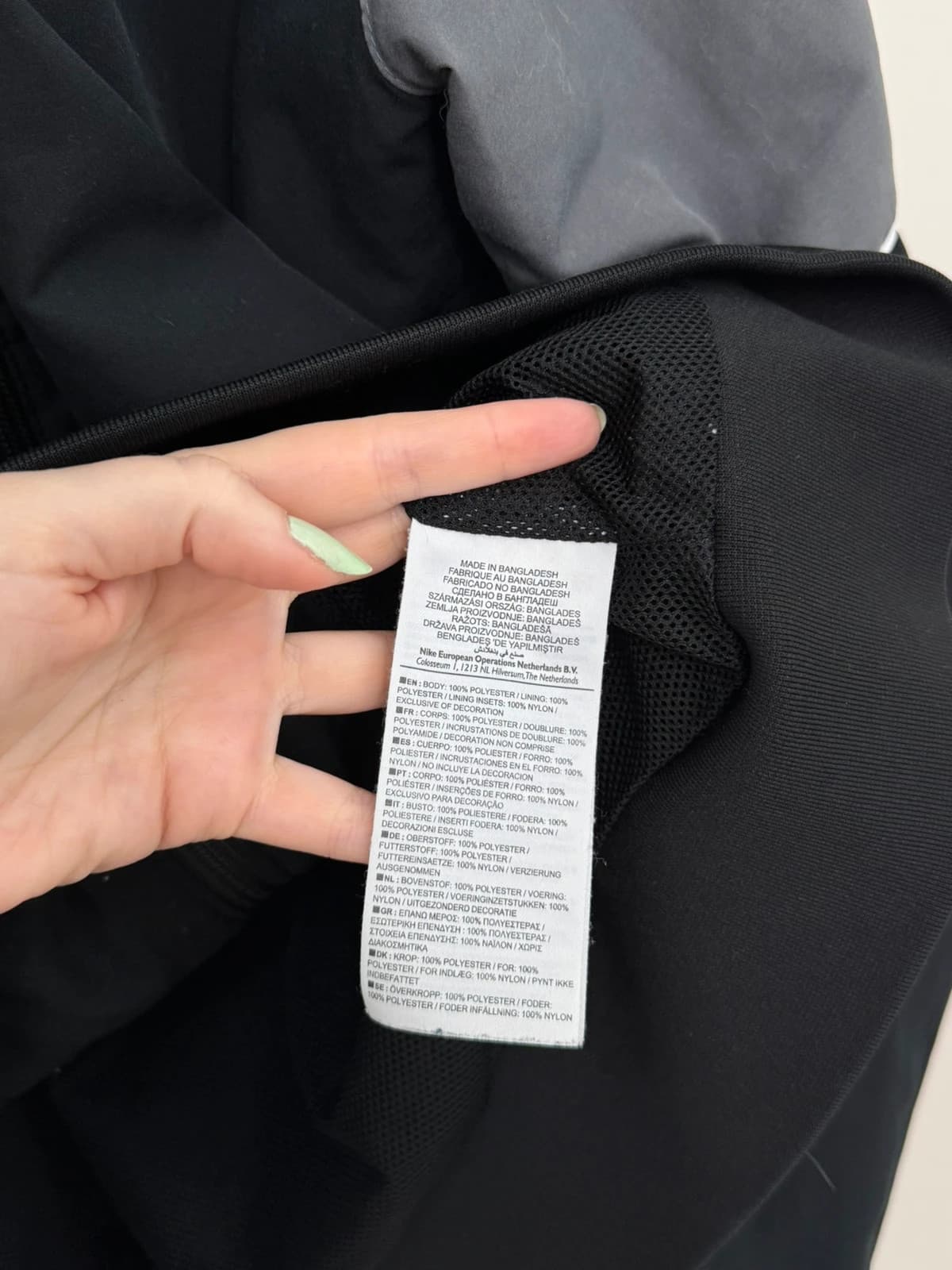 Veste Nike noire et grise coupe sport taille XL - Photo 6/10