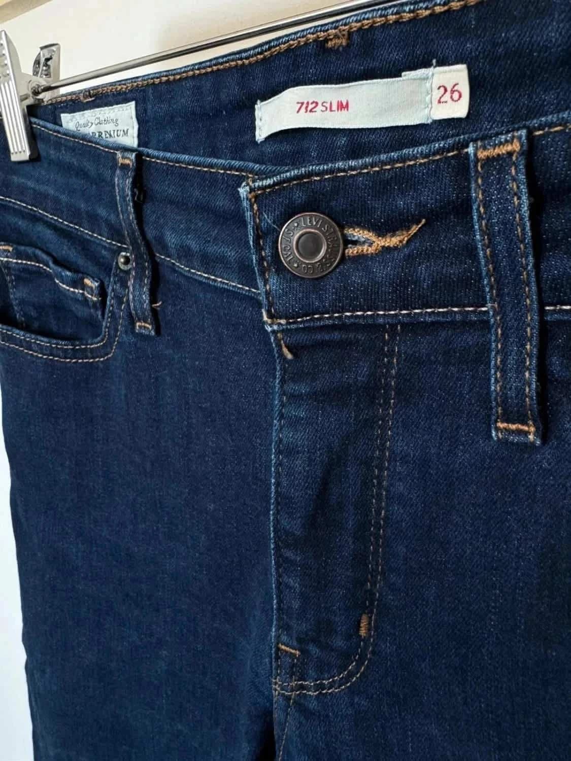Levi’s 712 Slim jean bleu brut stretch W26 L32 - Photo 3/8