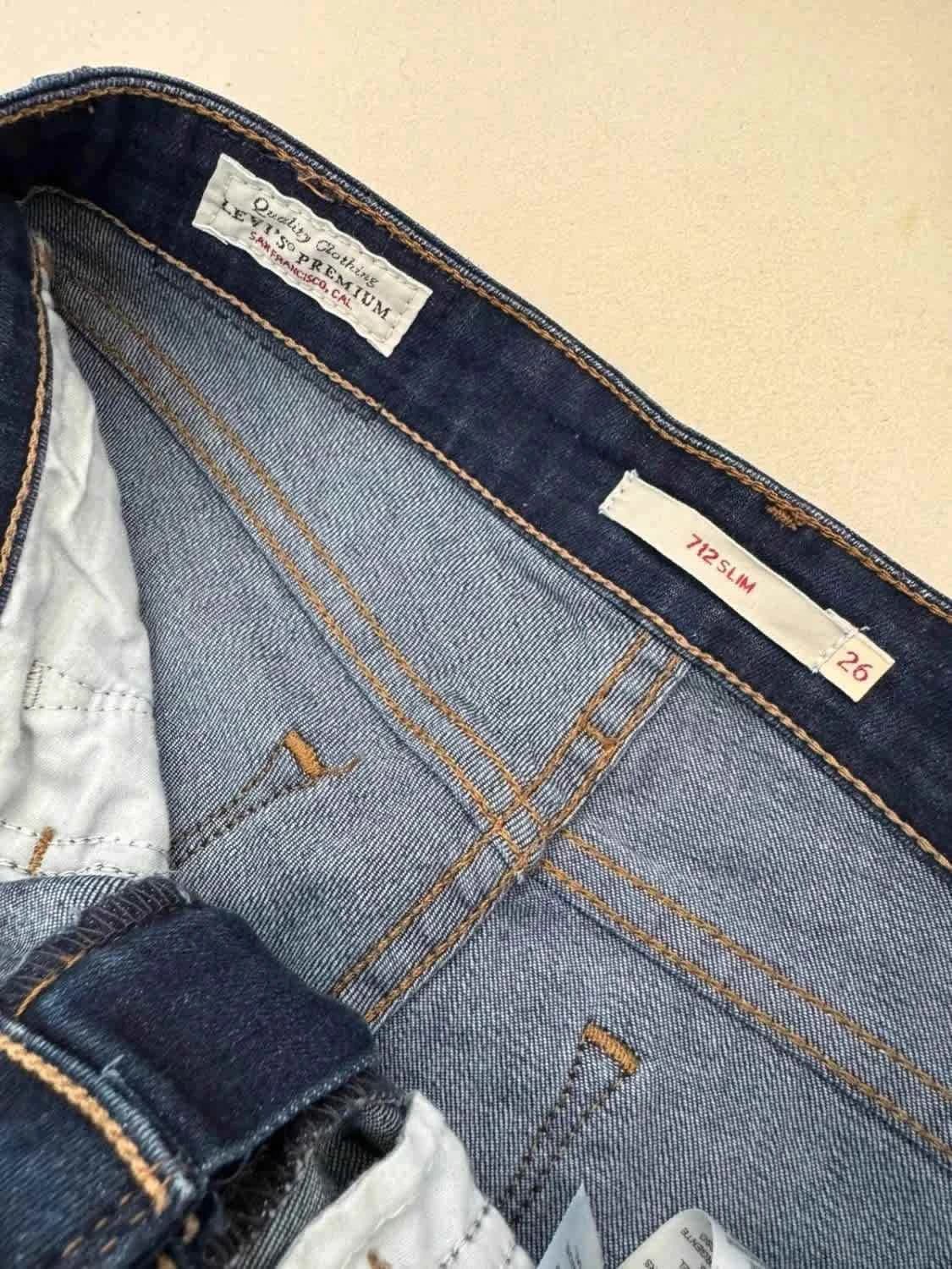 Levi’s 712 Slim jean bleu brut stretch W26 L32 - Photo 5/8