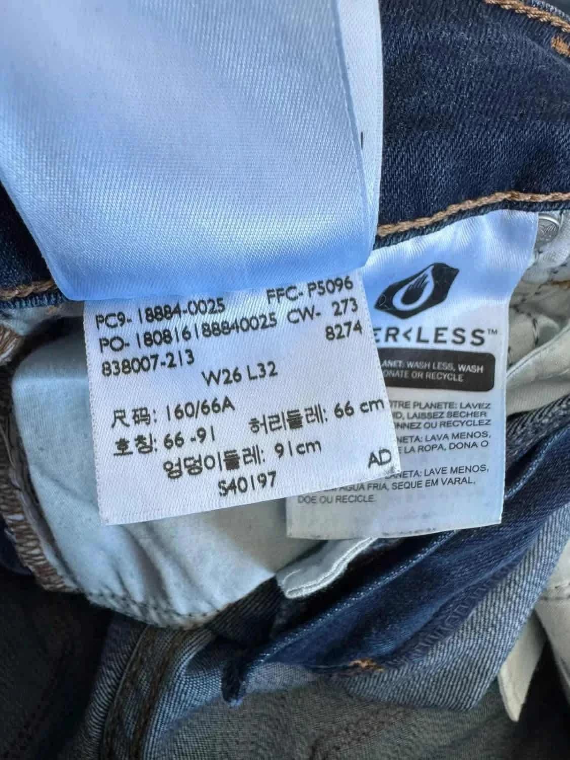 Levi’s 712 Slim jean bleu brut stretch W26 L32 - Photo 7/8