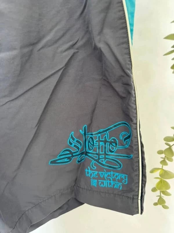 Short de bain gris et bleu Lotto taille XL - Photo 3/6