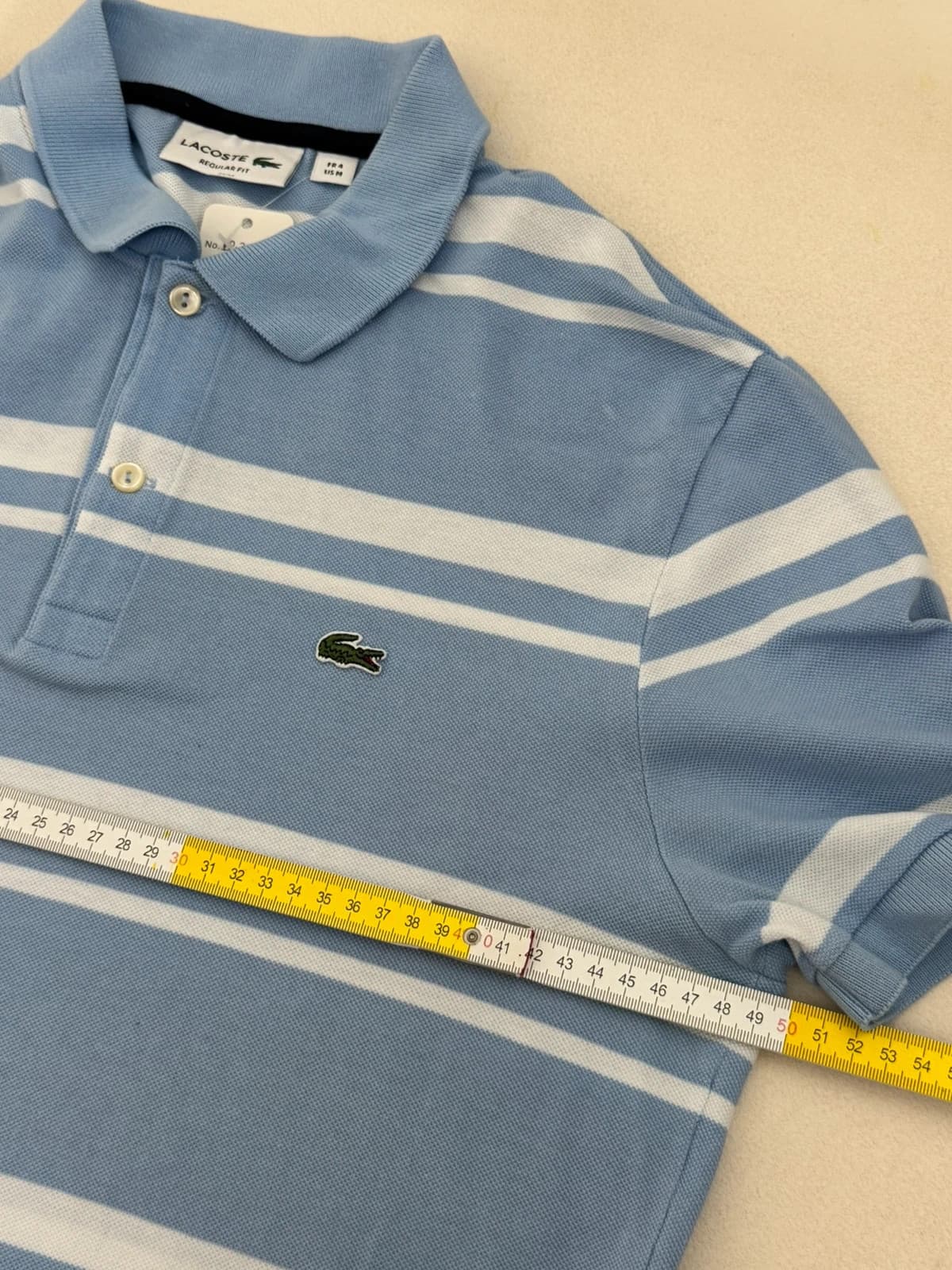 Polo piqué Lacoste rayé bleu ciel blanc taille 4/M - PP2603292 - Photo 7/8