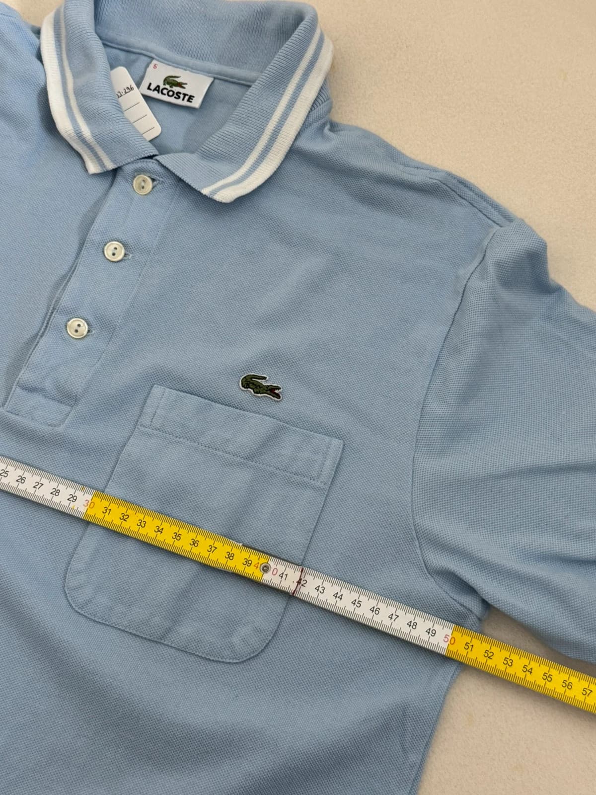 Polo piqué Lacoste bleu ciel poche poitrine taille 5/M - PP2603296 - Photo 6/7
