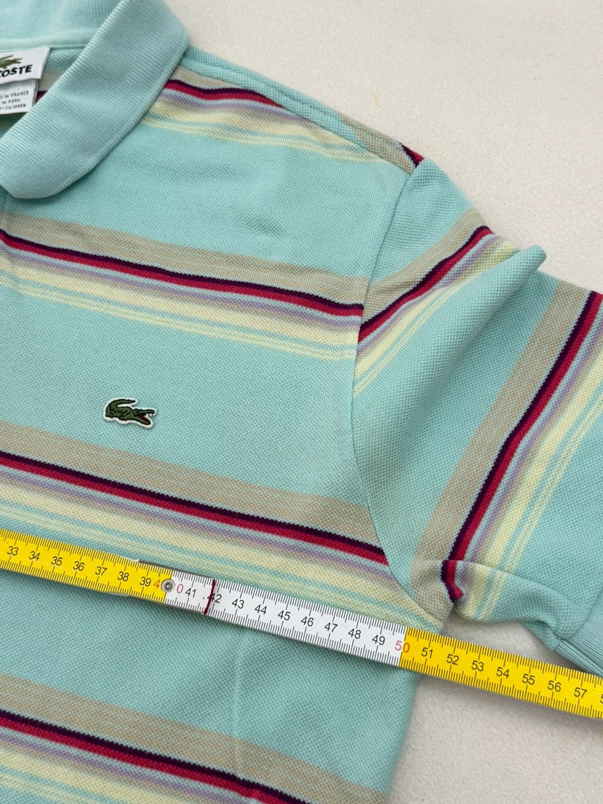 Polo piqué Lacoste rayé pastel bleu taille 4/M - PP2603262 - Photo 7/8