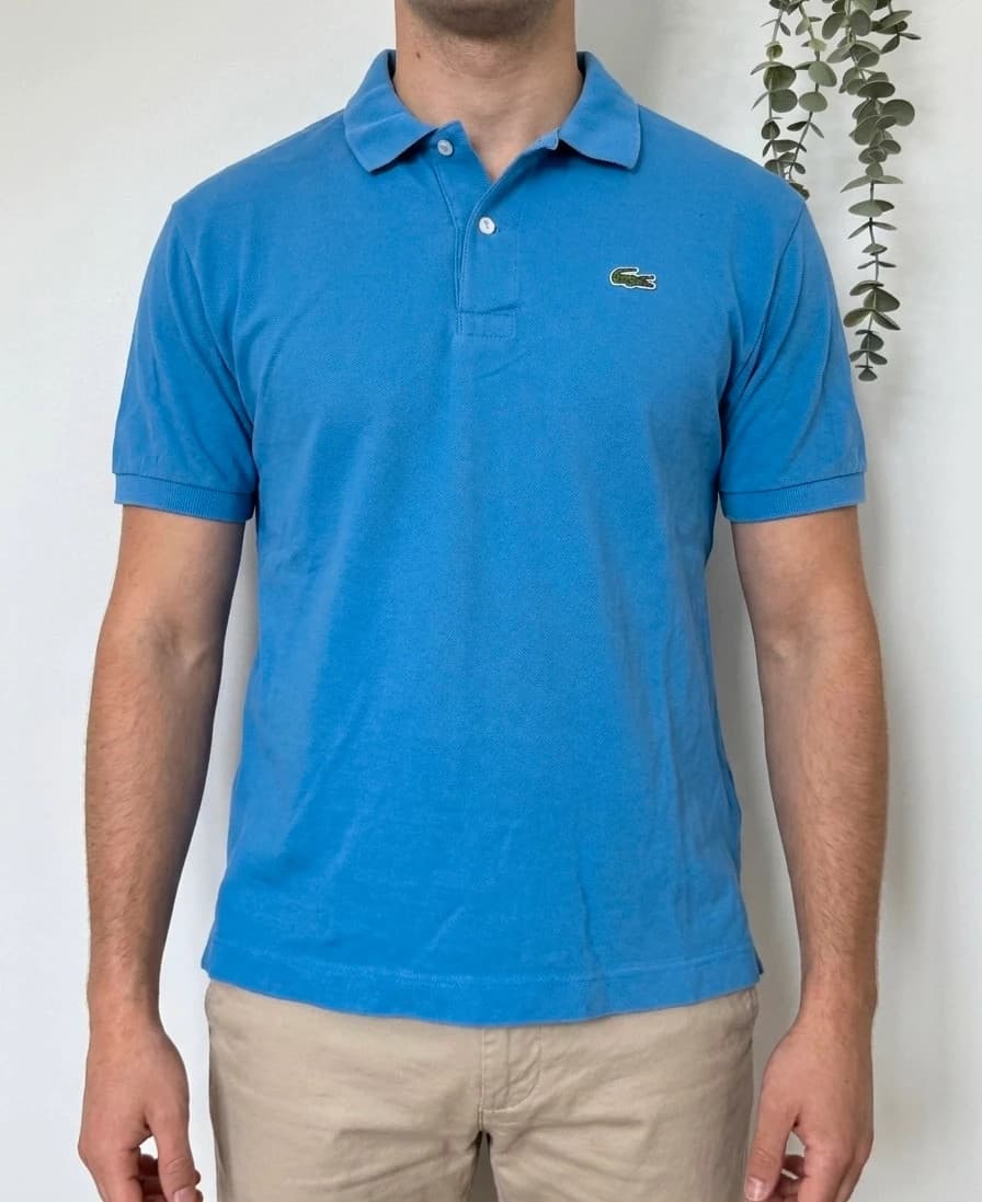 Polo piqué Lacoste bleu taille 6/L - PP2603295 - Photo 1/9