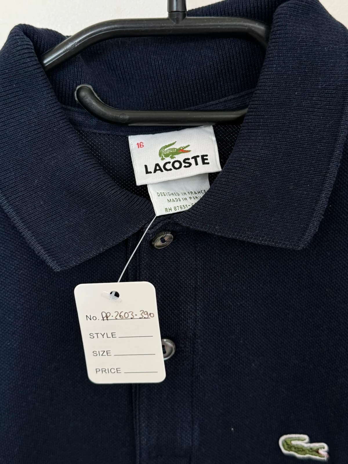 Polo piqué Lacoste bleu marine taille 16/S - PP2603390 - Photo 4/8