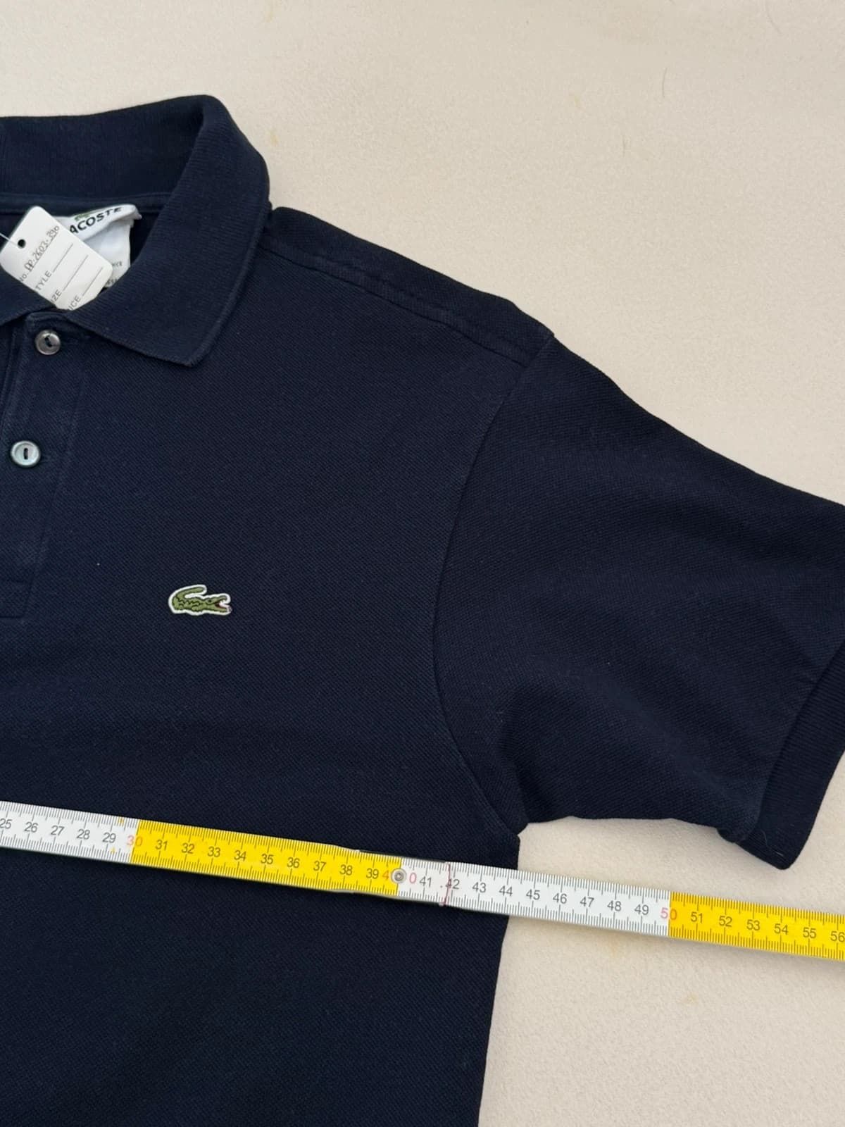 Polo piqué Lacoste bleu marine taille 16/S - PP2603390 - Photo 7/8