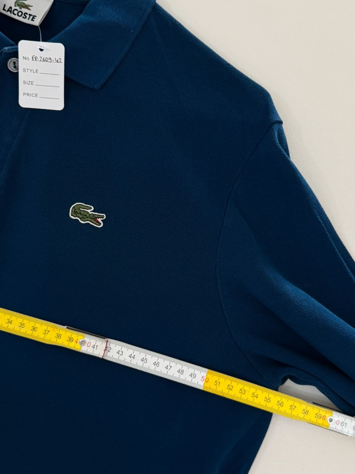 Polo piqué Lacoste bleu manches longues taille 5/L - FP260942 - Photo 8/9