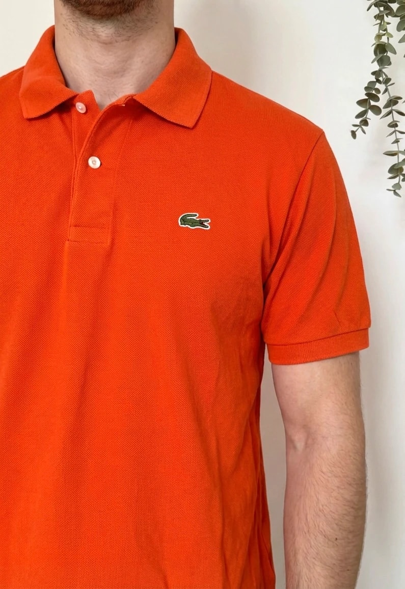Polo piqué vintage Lacoste orange taille 4/M - FP260225