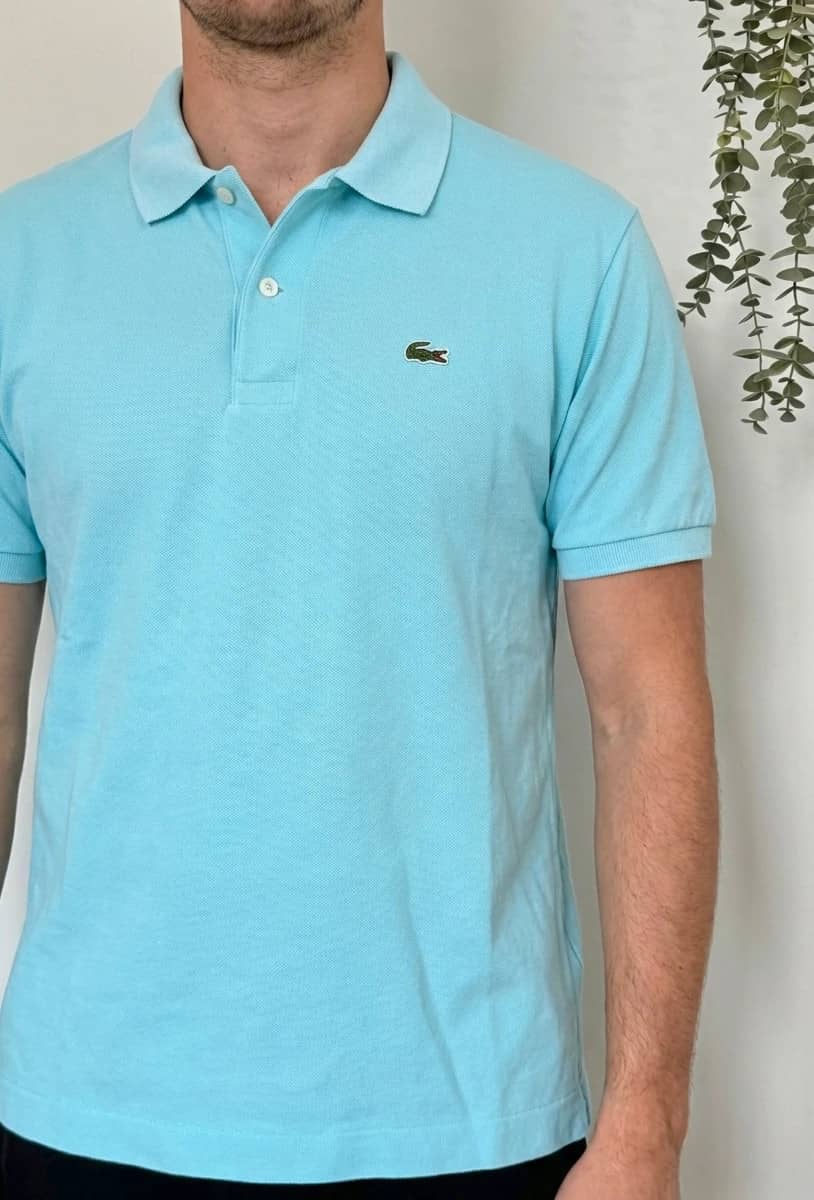 Polo piqué vintage Lacoste bleu ciel taille 5/L - FP260247